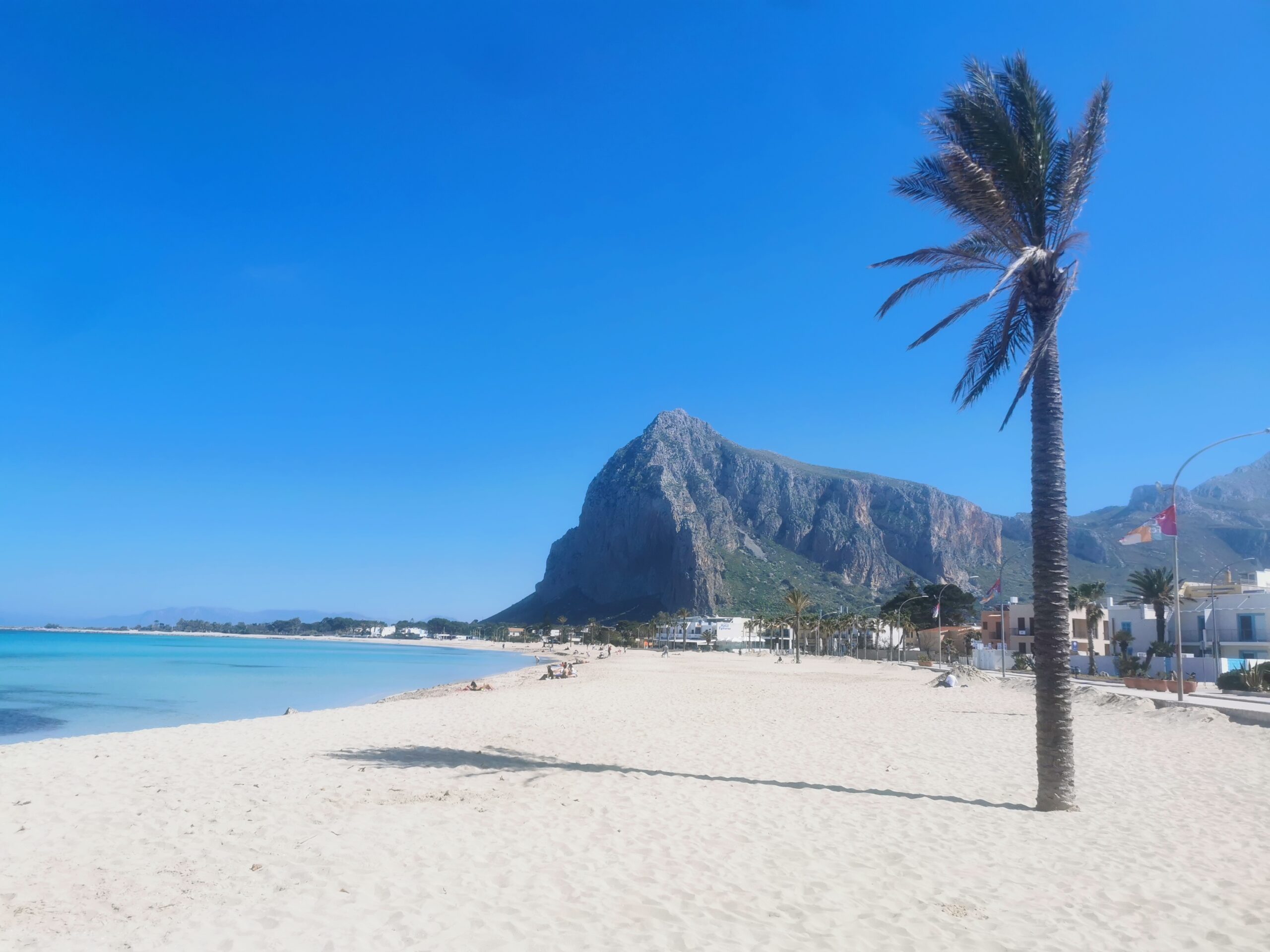 Spiaggia di San Vito Lo Capo con mare turchese e sabbia bianca